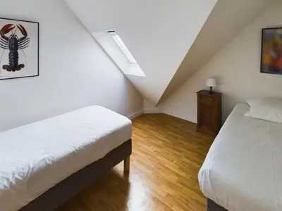 Un ou plusieurs lits dans un hébergement de l'établissement -NAYA- Maison familiale a deux pas de la mer