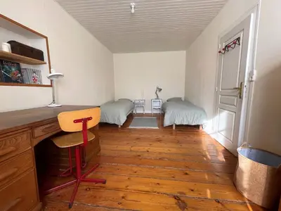 Un ou plusieurs lits dans un hébergement de l'établissement Grande maison familiale au cœur du Finistère