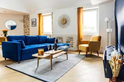 Coin salon dans l'établissement LE BIG ARISTIDE - Superbe Duplex en Centre-ville - 3 chambres