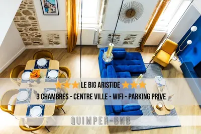 Coin salon dans l'établissement LE BIG ARISTIDE - Superbe Duplex en Centre-ville - 3 chambres
