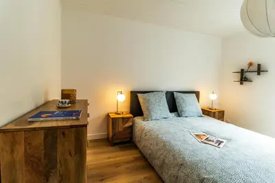 Un ou plusieurs lits dans un hébergement de l'établissement LE BIG ARISTIDE - Superbe Duplex en Centre-ville - 3 chambres