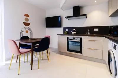 Cuisine ou kitchenette dans l'établissement Au jardin Ginkgo