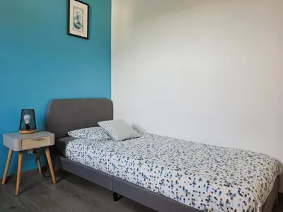 Un ou plusieurs lits dans un hébergement de l'établissement Maison moderne proche plage Morgat