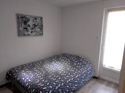 Un ou plusieurs lits dans un hébergement de l'établissement Un Appartement tout à vous