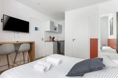 Un ou plusieurs lits dans un hébergement de l'établissement STUDIOS cosy au centre-ville quartier Jaurès et Saint-Martin