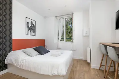Un ou plusieurs lits dans un hébergement de l'établissement STUDIOS cosy au centre-ville quartier Jaurès et Saint-Martin