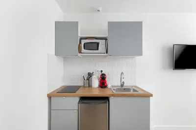 Cuisine ou kitchenette dans l'établissement STUDIOS cosy au centre-ville quartier Jaurès et Saint-Martin