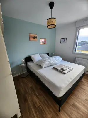 Un ou plusieurs lits dans un hébergement de l'établissement Ti an holen Maison familiale de charme à 5mn à pied de la plage et du port