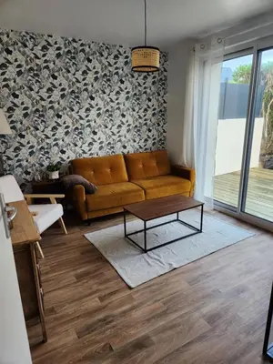 Coin salon dans l'établissement Ti an holen Maison familiale de charme à 5mn à pied de la plage et du port