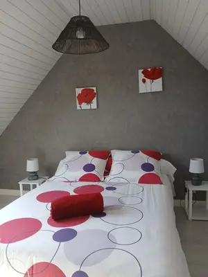 Un ou plusieurs lits dans un hébergement de l'établissement Les hortensias de papy