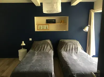 Un ou plusieurs lits dans un hébergement de l'établissement Villa Roche Mignonne