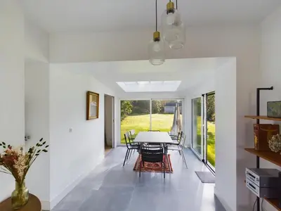 Coin salon dans l'établissement -OZARIO- Magnifique maison au Cabellou