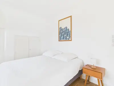 Un ou plusieurs lits dans un hébergement de l'établissement -OZARIO- Magnifique maison au Cabellou