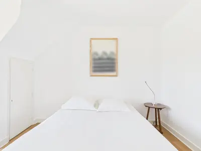 Un ou plusieurs lits dans un hébergement de l'établissement -OZARIO- Magnifique maison au Cabellou