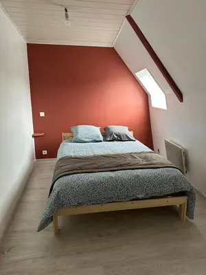 Un ou plusieurs lits dans un hébergement de l'établissement Petite maison sur ferme 5min de la plage idéal professionnel
