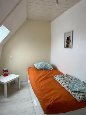 Un ou plusieurs lits dans un hébergement de l'établissement Petite maison sur ferme 5min de la plage idéal professionnel