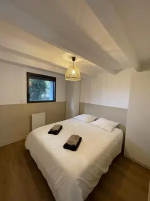 Un ou plusieurs lits dans un hébergement de l'établissement Nouveauté Ty Cosquer Maison de vacances proche plages