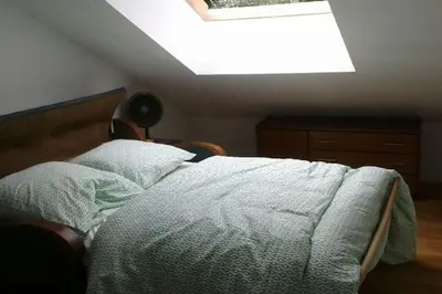 Un ou plusieurs lits dans un hébergement de l'établissement Bel appartement vue sur mer à Primel Trégastel