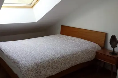 Un ou plusieurs lits dans un hébergement de l'établissement Bel appartement vue sur mer à Primel Trégastel
