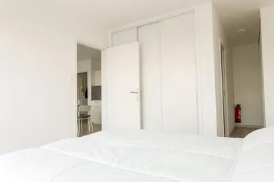 Un ou plusieurs lits dans un hébergement de l'établissement Appartement pour 4 avec vue sur mer, Benodet