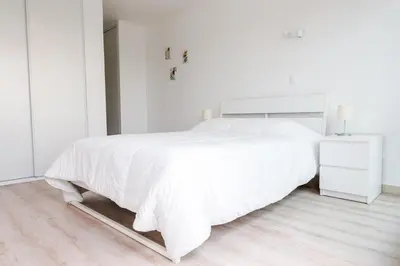 Un ou plusieurs lits dans un hébergement de l'établissement Appartement pour 4 avec vue sur mer, Benodet