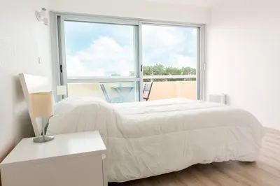 Un ou plusieurs lits dans un hébergement de l'établissement Appartement pour 4 avec vue sur mer, Benodet
