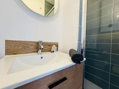 Salle de bains dans l'établissement Résidence des Quais - Centre ville - Wifi - Netflix