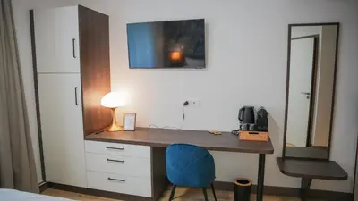 Télévision ou salle de divertissement dans l'établissement KoonTy - Chambres et Appartements à Landerneau