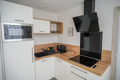 Cuisine ou kitchenette dans l'établissement KoonTy - Chambres et Appartements à Landerneau