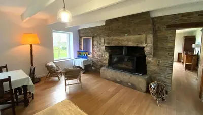 Télévision ou salle de divertissement dans l'établissement House on the golf course with sea views