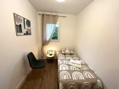Un ou plusieurs lits dans un hébergement de l'établissement Apartment in Carantec near Sandy Beaches