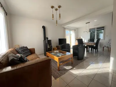 Coin salon dans l'établissement Maison des Dunes
