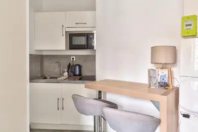 Cuisine ou kitchenette dans l'établissement STUDIOS cosy Quartier Harteloire proche centre-ville