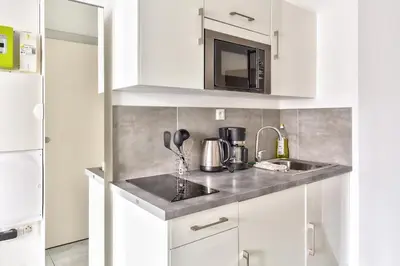 Cuisine ou kitchenette dans l'établissement STUDIOS cosy Quartier Harteloire proche centre-ville