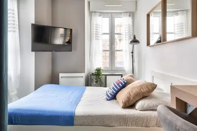 Un ou plusieurs lits dans un hébergement de l'établissement STUDIOS cosy Quartier Harteloire proche centre-ville