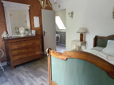 Un ou plusieurs lits dans un hébergement de l'établissement Maison dans un environnement boisé très calme