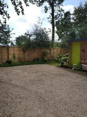Jardin de l'établissement Maison dans un environnement boisé très calme