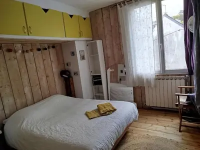 Un ou plusieurs lits dans un hébergement de l'établissement Cosy House