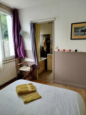 Un ou plusieurs lits dans un hébergement de l'établissement Cosy House