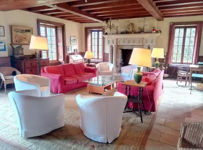 Coin salon dans l'établissement Ar Maner - Grande maison familiale - 7 chambres - Jardin