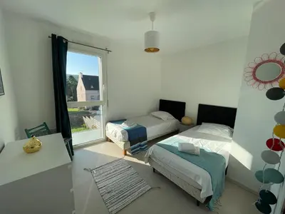 Un ou plusieurs lits dans un hébergement de l'établissement Maison Morgat - 3 chambres - Terrasse - Jardin