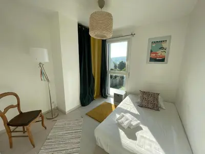 Un ou plusieurs lits dans un hébergement de l'établissement Maison Morgat - 3 chambres - Terrasse - Jardin