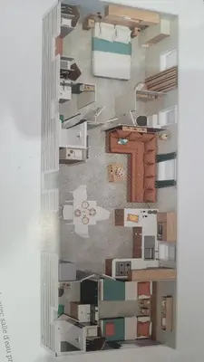 Cuisine ou kitchenette dans l'établissement Magnifique Mobil home 40 m2 Grand Confort