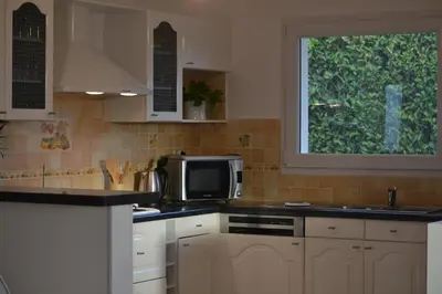 Cuisine ou kitchenette dans l'établissement Le Gite des 4 Vents