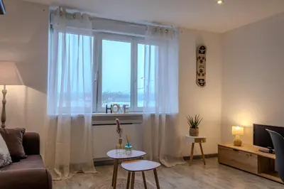 Coin salon dans l'établissement Ti Gat- vue mer - wifi