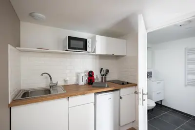 Cuisine ou kitchenette dans l'établissement Pokou