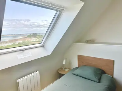 Un ou plusieurs lits dans un hébergement de l'établissement La marée basse - vue mer imprenable