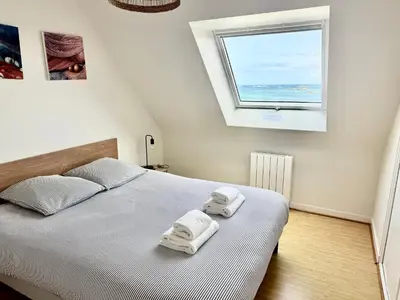 Un ou plusieurs lits dans un hébergement de l'établissement La marée basse - vue mer imprenable