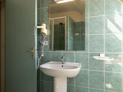 Salle de bains dans l'établissement La Maison de Saint-Hernot