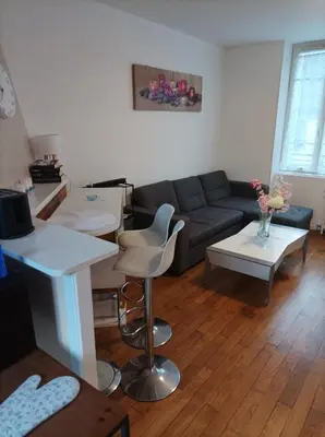 Coin salon dans l'établissement Ici, on y revient par plaisir